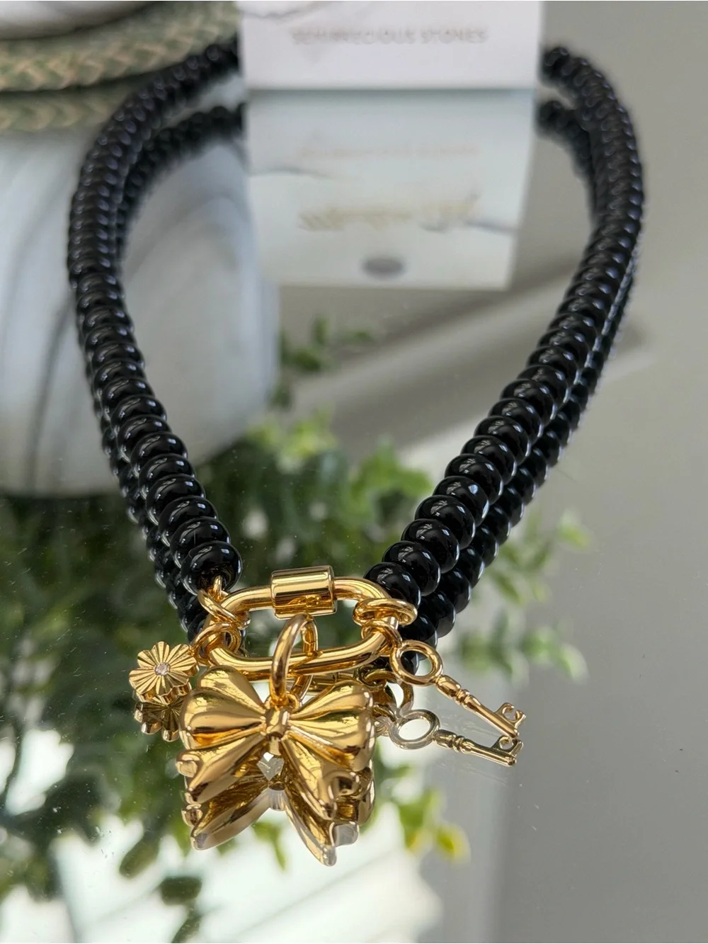 Madewell Semiprecious Bead Necklace Gold Bow Charm Key Black NWT - Picture 3 of 5